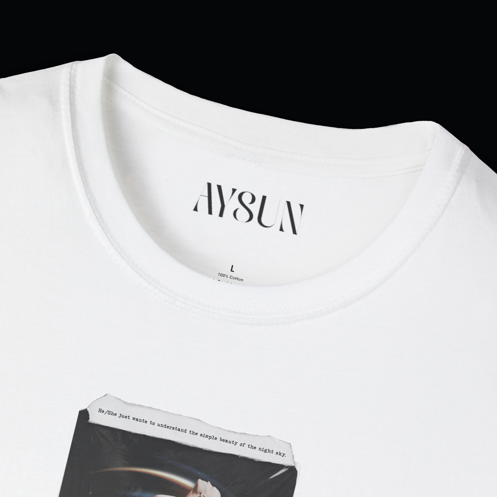 Person wearing a black t-shirt with a graphic design and light blue jeans on a white background